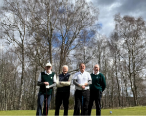 Peter Edwards (on left) with David Blackmore (white shirt) with opponents from Boat of Garten